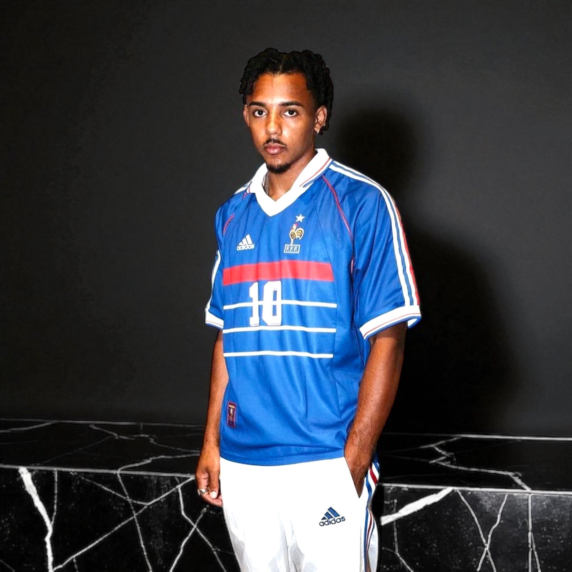 Kounde posing in classic France jersey of Les Bleus